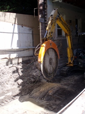 This Echidna with 1200mm blade is being used to create an extra level under a house in a Sydney suburb.